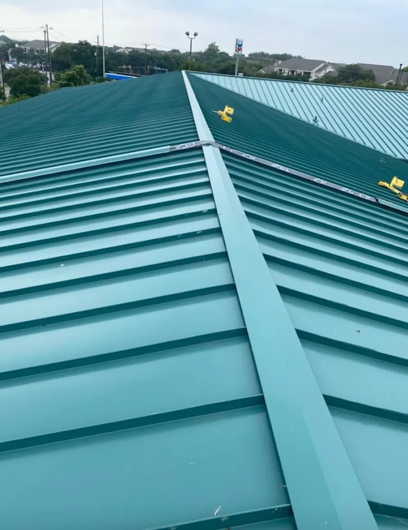 Green commercial metal roof ridge and valley for Metal Roof Repair in Edgewater