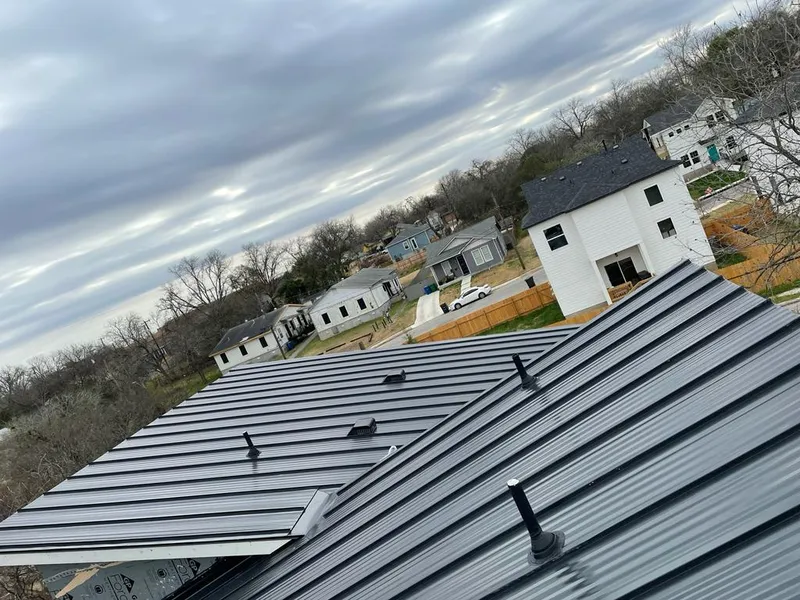 Standing seam metal roof panels with vents for Skylight Repair in Edgewater